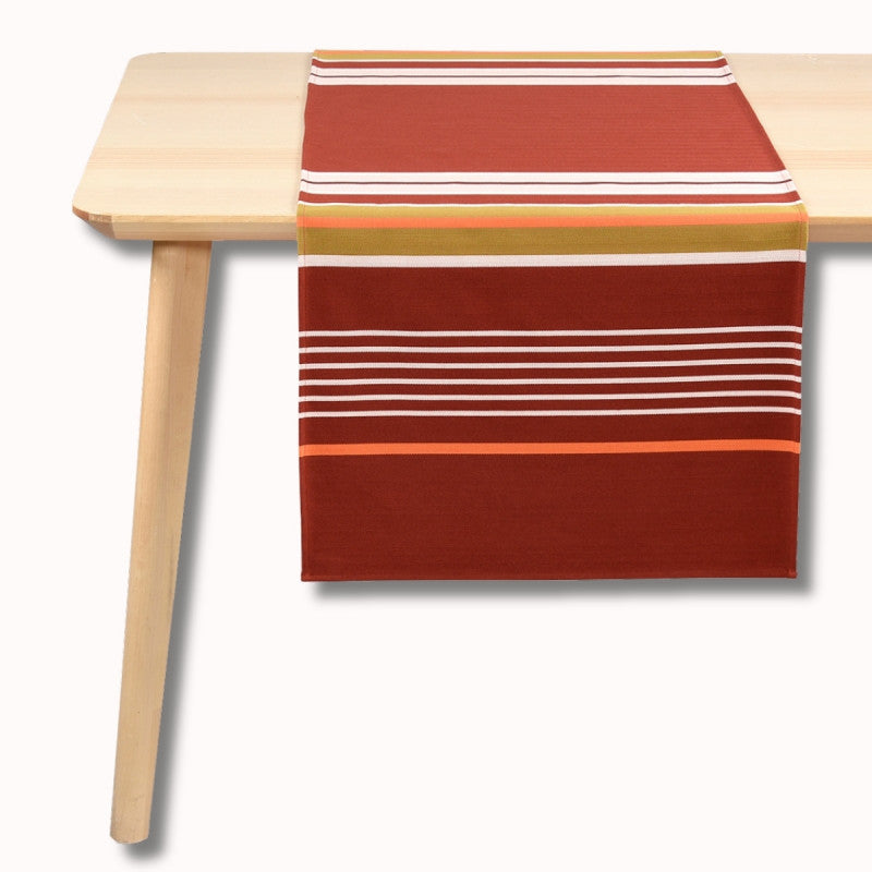 Jeté de table Artiga Sarron - rayures colorées sur fond rouge profond