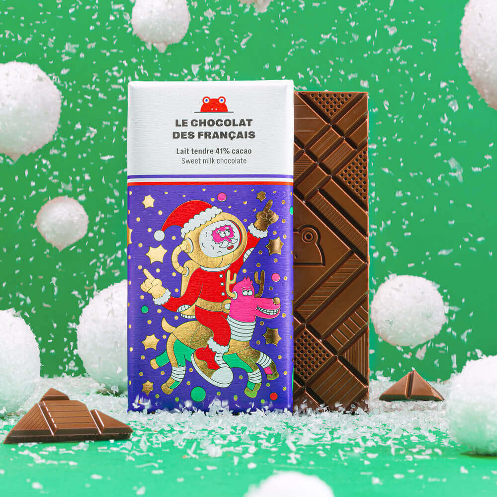 Tablette de chocolat au lait bio, illustration festive Père Noël sur son renne