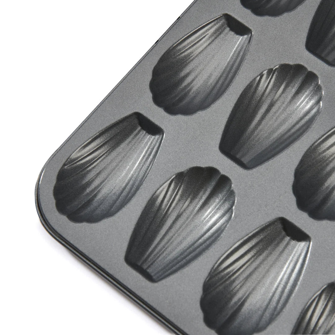Plaque 12 madeleines acier antiadhésif 7x4x1,5cm - De Buyer