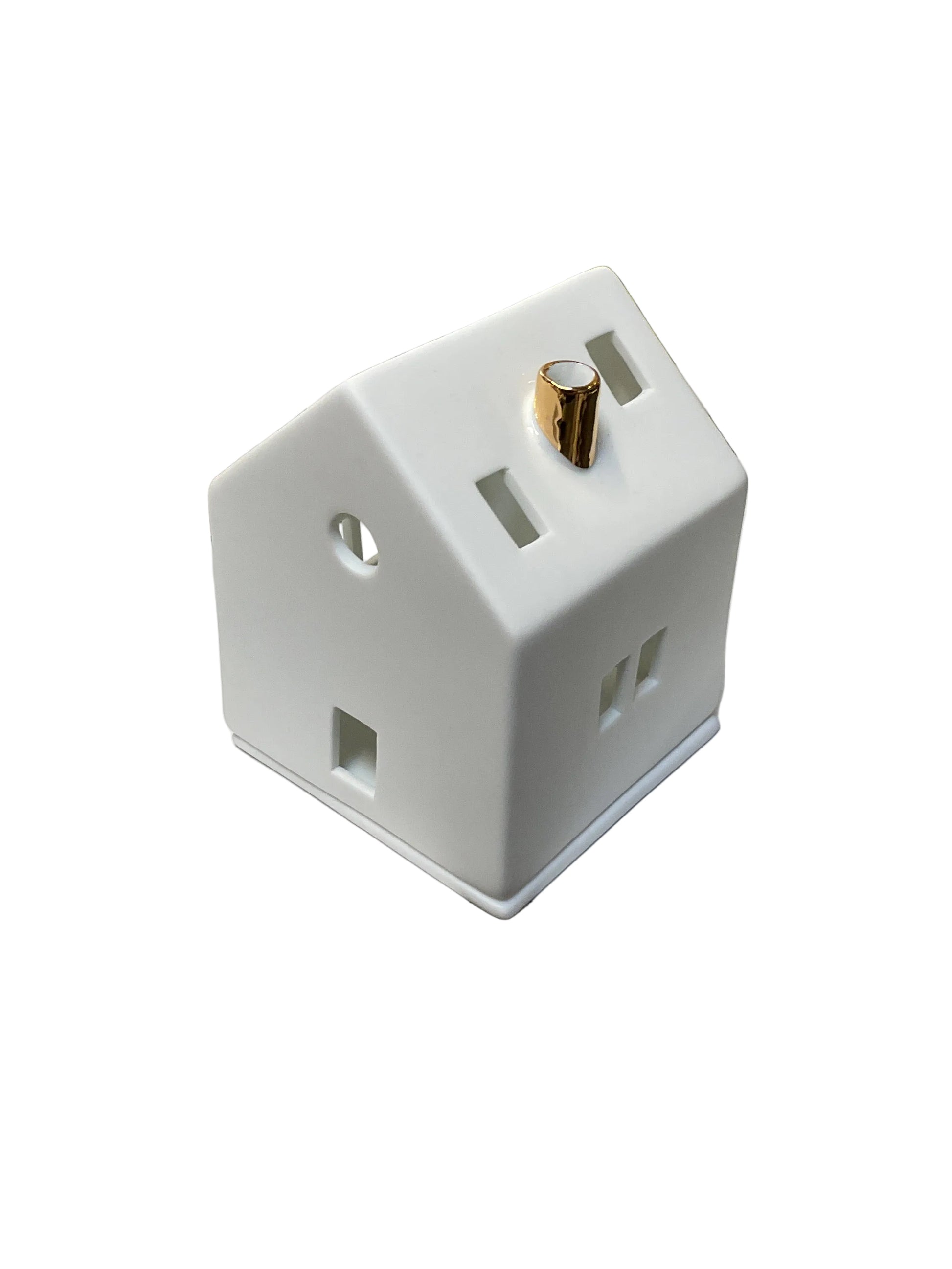 Maison lumineuse cheminée dorée Räder porcelaine blanche