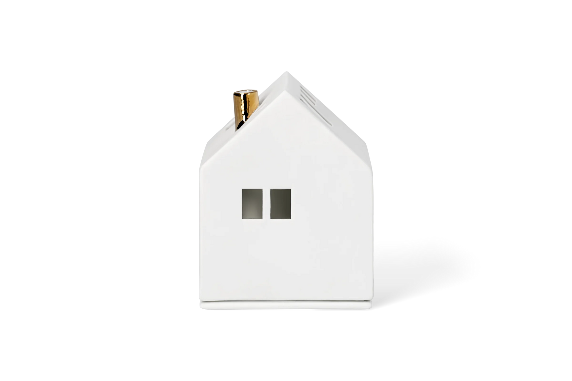 Maison lumineuse cheminée dorée Räder porcelaine blanche