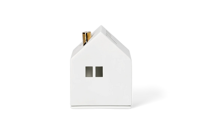 Maison lumineuse cheminée dorée Räder porcelaine blanche