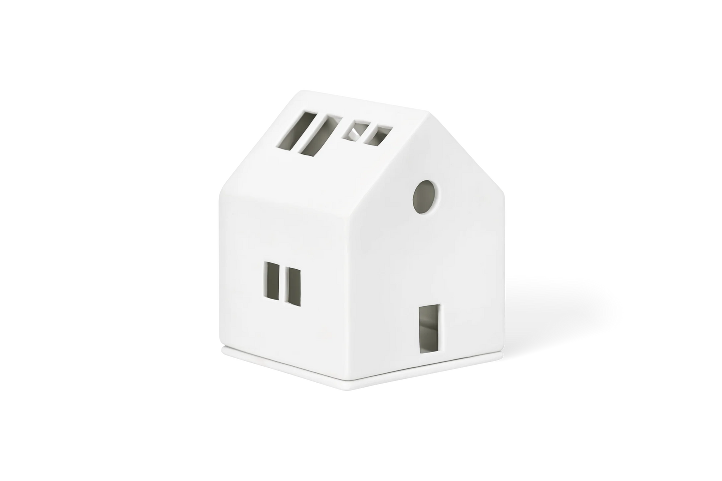 Maison lumineuse cheminée dorée Räder porcelaine blanche