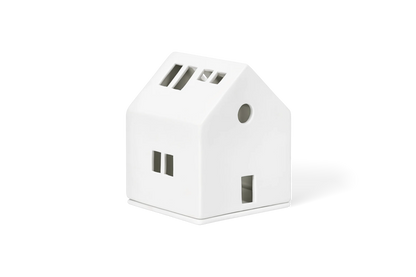 Maison lumineuse cheminée dorée Räder porcelaine blanche