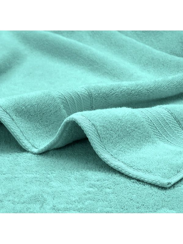 Carré éponge 30x30 bleu en coton avec œillet métallique, collection Elea Curacao