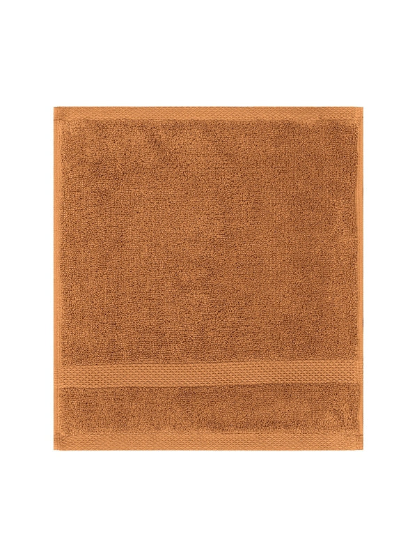 Carré de bain Elea 50x50 cm en coton orange rouille, éponge douce et absorbante