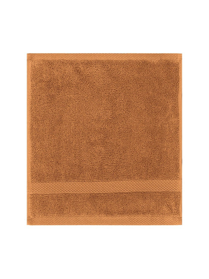 Carré de bain Elea 50x50 cm en coton orange rouille, éponge douce et absorbante