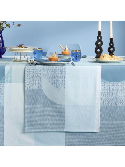 Chemin de table mille textures bleu en coton 55x180 avec ourlets soignes