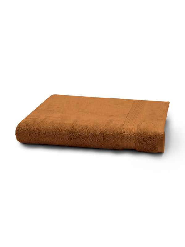 Drap de bain Elea rouille 100x150 cm en pur coton, éponge zéro twist avec finitions litteau