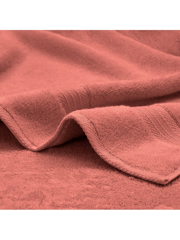 Drap de douche Elea corail 70x140 en coton avec liteau décoratif