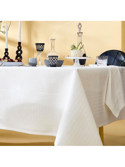 Nappe carrée blanche 155x155 en coton avec finitions coins capuchons