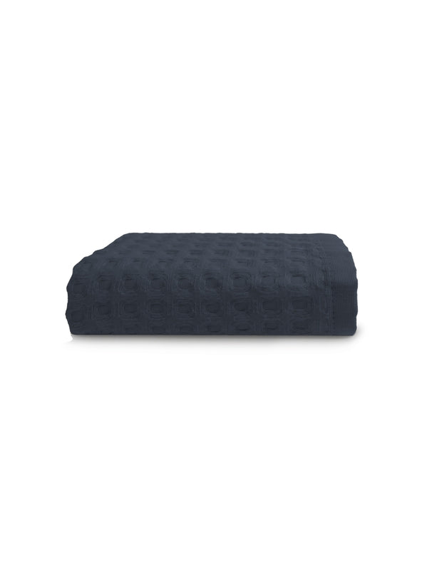 Serviette éponge marine 50x100 cm en coton 100% avec finition liteau renforcée