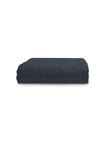 Serviette éponge marine 50x100 cm en coton 100% avec finition liteau renforcée