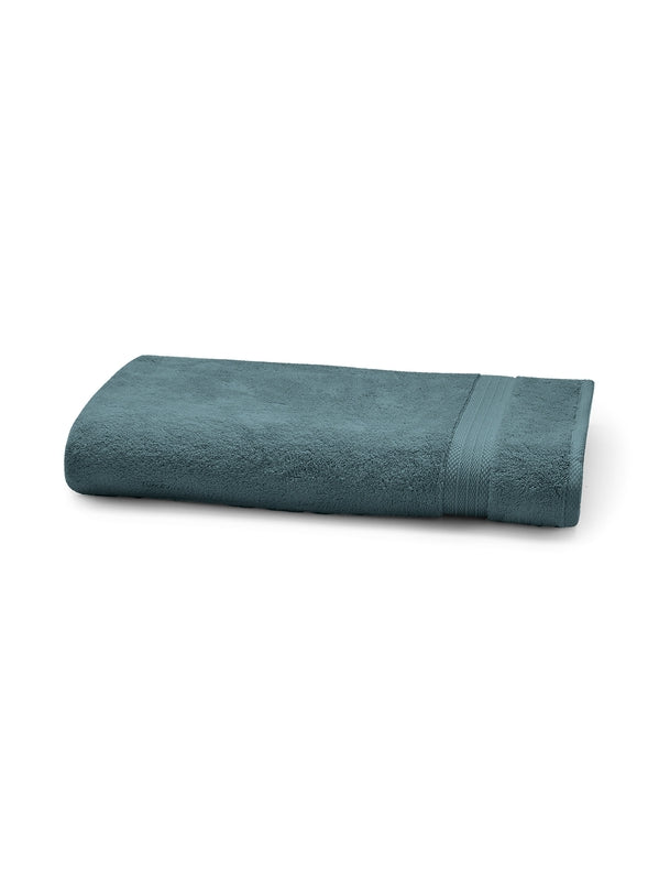 Serviette éponge Elea coloris pétrole 50x100 cm en coton zéro twist, moelleuse et absorbante