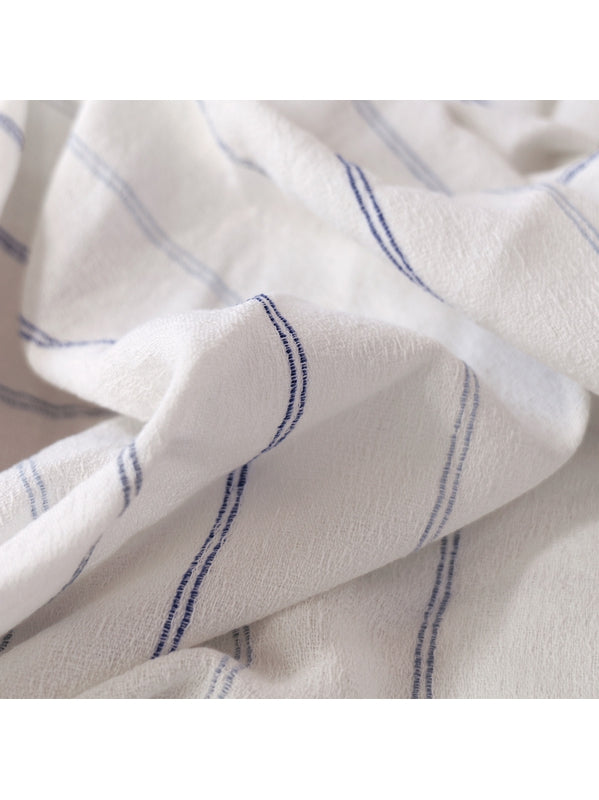 Serviette de table Rimini Blu 50x50 en coton lavé blanc, aspect légèrement froissé