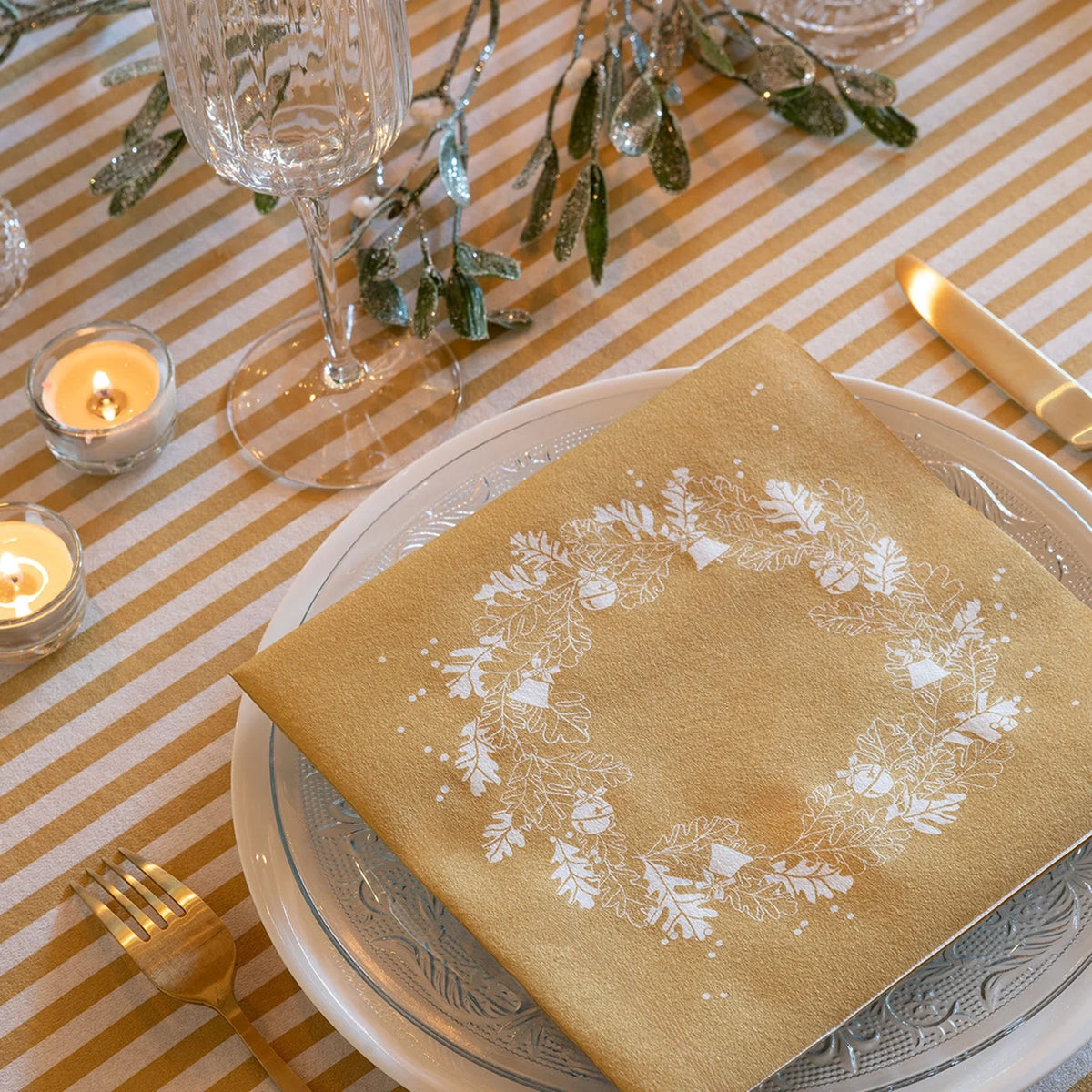 Serviette de table motif grelots dorés de fête