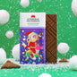 Tablette de chocolat au lait bio, illustration festive Père Noël sur son renne
