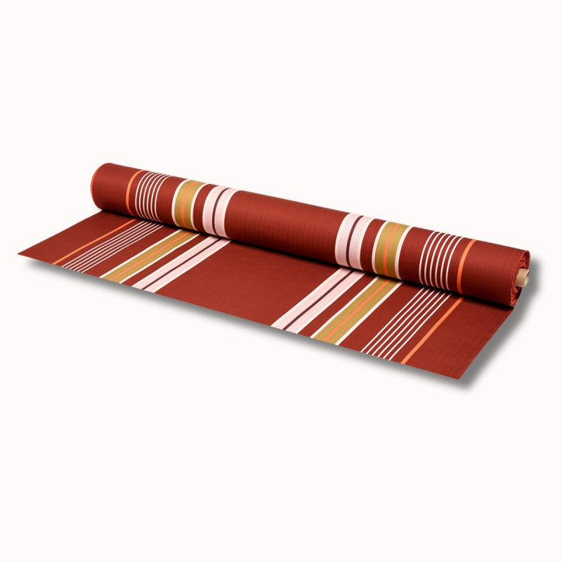 Toile enduite au mètre Artiga Sarron - rayures colorées sur fond rouge profond