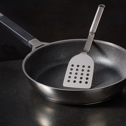Spatule perforée manche rond - Rösle
