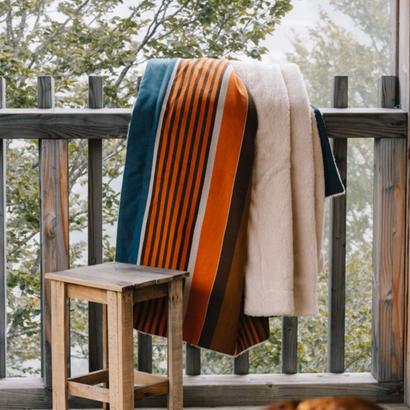 Plaid biface Artiga Bats - rayures pétrole, chocolat, orange et caramel