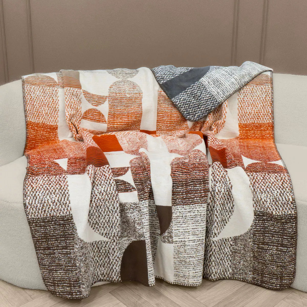 Plaid Textures Argile en jacquard aux tons gris et orangé