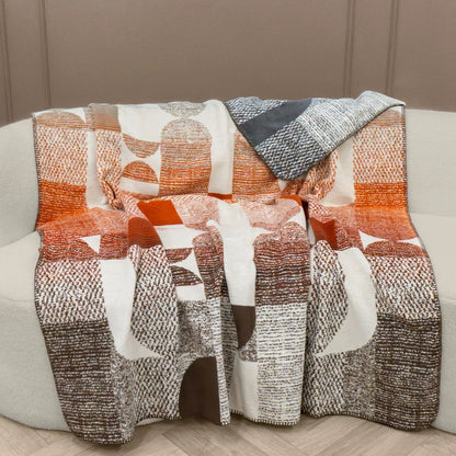Plaid Textures Argile en jacquard aux tons gris et orangé